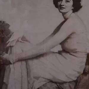 Portrait of Hazel ffennell seated with a dove on her knee, by Harold Speed